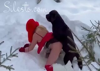 Zoophile lady gets fucked by her dog in the snow