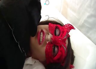 Raven-haired babe is enjoying anal with her dog